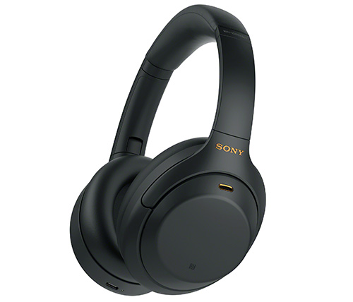 אוזניות אלחוטיות Sony WH-1000XM4 עם מיקרופון Bluetooth בצבע שחור אחריו